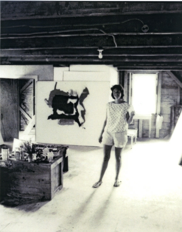 Helen Frankenthaler in her Days Lumberyard studio, standing in front of&nbsp;&quot;Black With Shadows&quot; in Provincetown, Massachusetts, summer 1961.&nbsp;